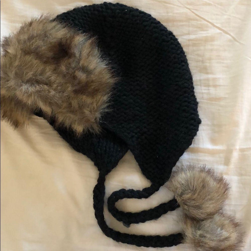 Crotchet hat with fake fur trim.